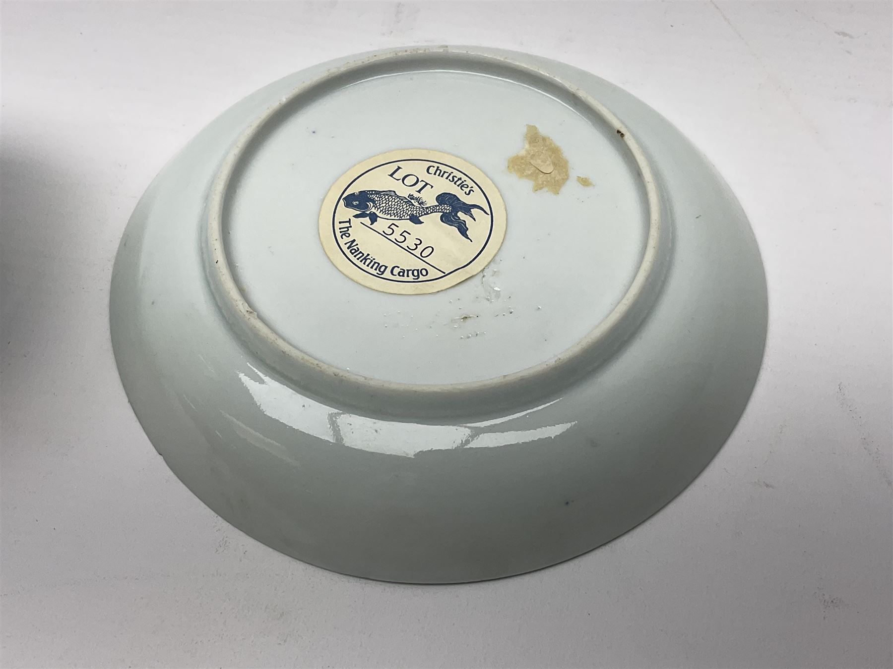 Chinese Nanking Cargo tea bowl and saucer, each decorated with pin tree, saucer with Christie's lot label beneath, tea bowl D7.5cm, saucer D11.5cm