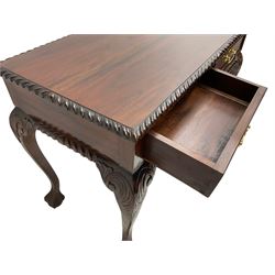 Georgian Chippendale design mahogany side table, rectangular top with gadrooned edge, fitted with two cock-beaded drawers, raised on cabriole supports with acanthus leaf moulding and ball and claw feet