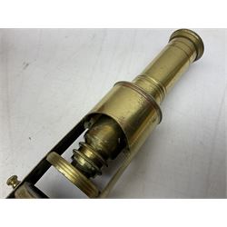  Brass field microscope, together with a cased microscope and twenty five microscope slides