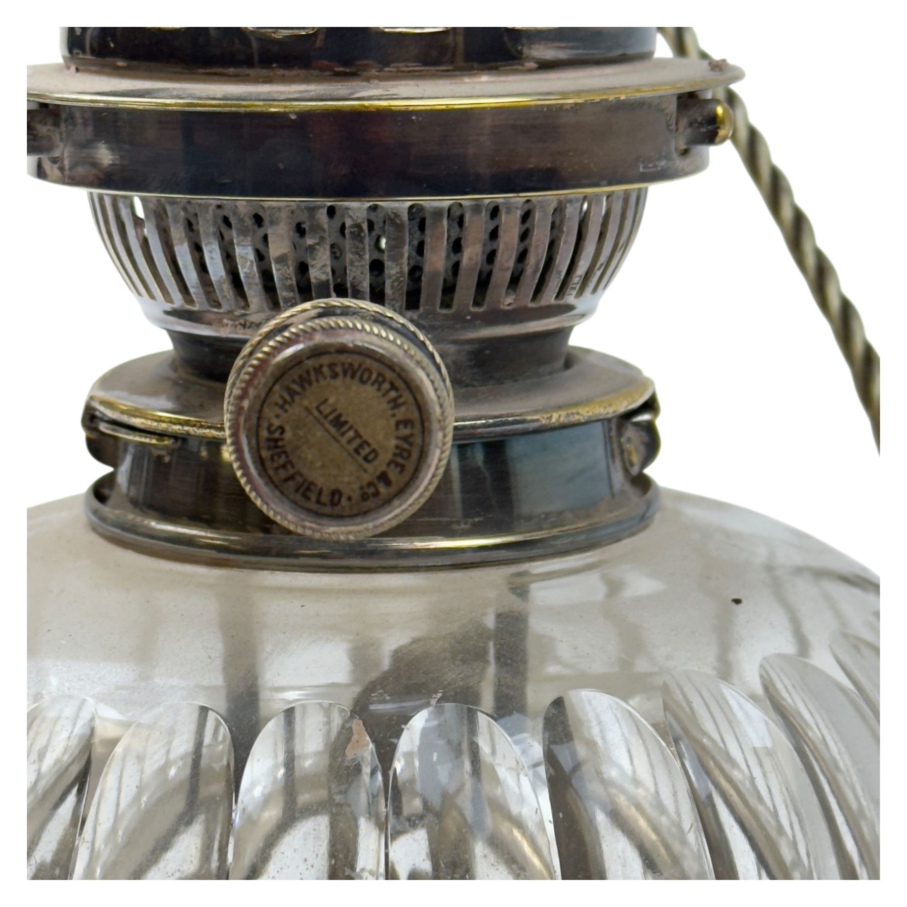 20th century Hinks student's oil lamp, silvered brass stand with faceted glass resovoir and green glass shade, H65cm