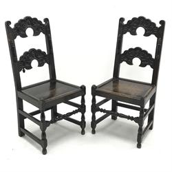  Pair 19th century oak hall chairs, detailed carved backs, solid seats, W50cm (2)  