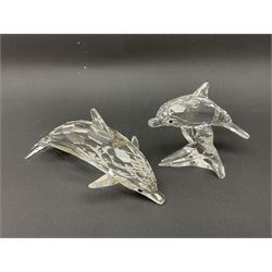 Nineteen Swarovski Crystal sea creatures, to include dolphins, seals, puffer fish, octopus, crabs, together with a quantity Swarovski Crystal shells 