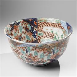 Japanese 19th century Imari bowl, painted profusely internally and externally with landsca...