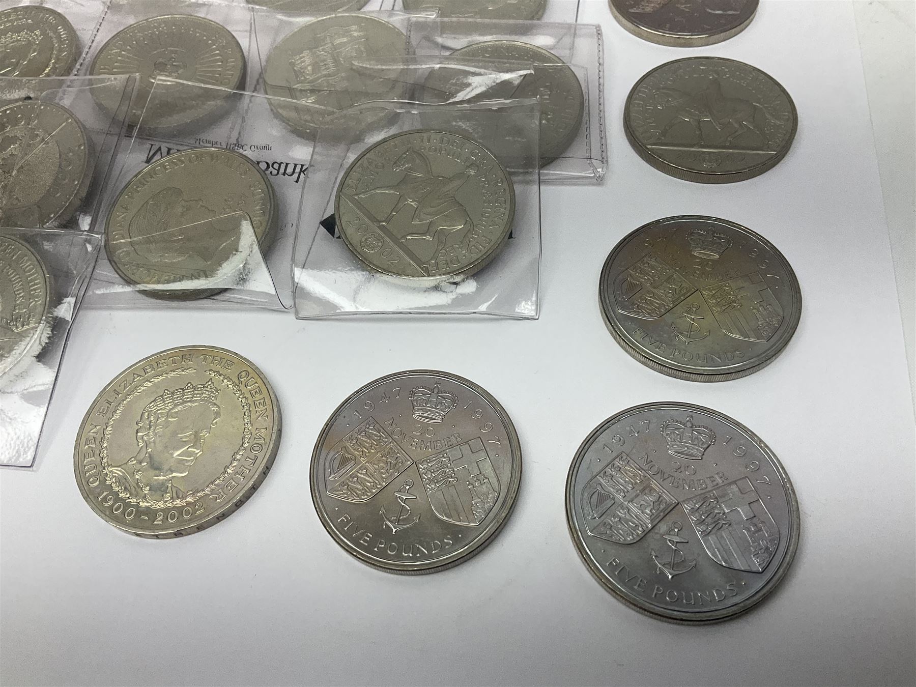 Thirty-six Queen Elizabeth II cupronickel five pound coins 