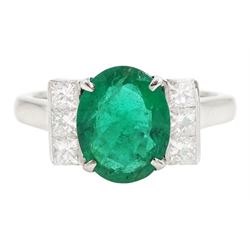 18ct white gold emerald and diamond ring, single oval cut emerald, each side set with three princess cut diamonds, stamped 750, emerald approx 1.90 carat, total diamond weight approx 0.50 carat