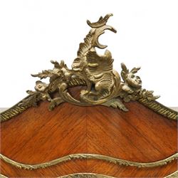 Louis XV revival kingwood Vernis-Martin serpentine fronted vitrine cabinet, arched top with gilt brass foliate mounts, glazed door with two shelves above three painted panels, depicting pastoral scenes, supported on out-swept cabriole legs with gilt brass mounts and sabots.