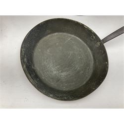 Four Victorian copper moulds, together with a graduating set of copper pans with wooden handles and finials to covers, largest pan 