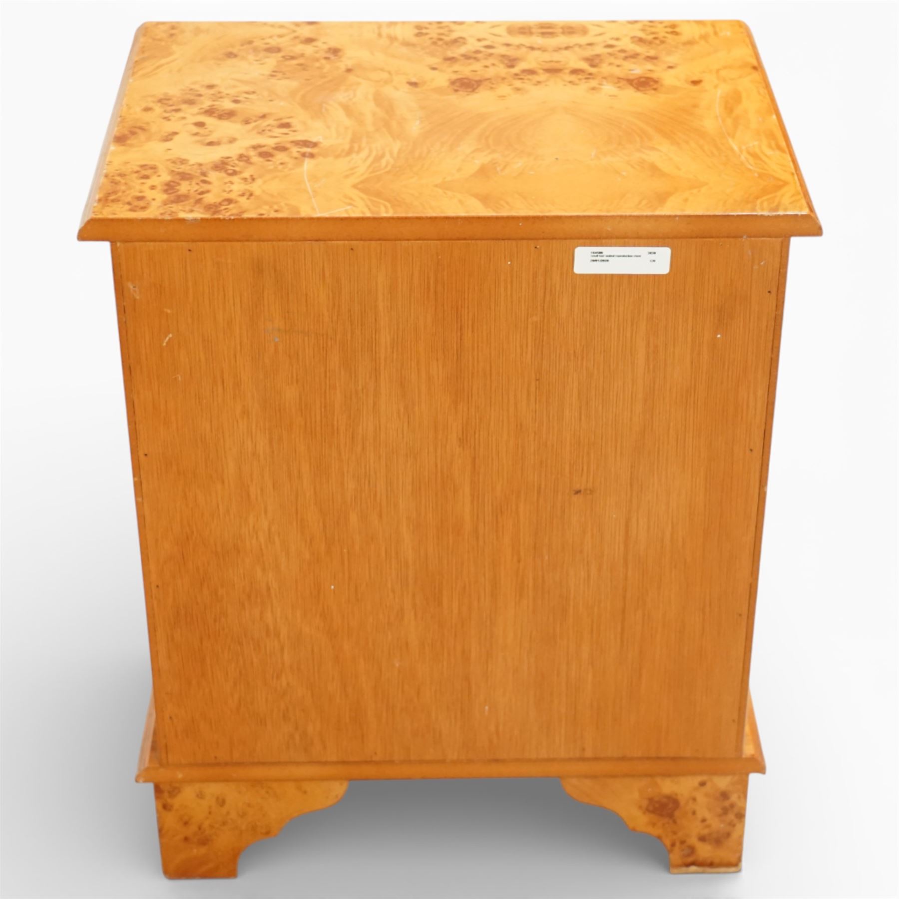 20th century burr walnut reproduction chest, rectangular moulded top over three long drawers, each fitted with circular ring handles, plain sides, raised on shaped bracket feet