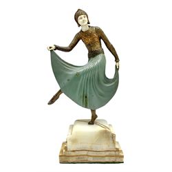 Joe Descomps (French 1869-1950): an Art Deco bronze and ivory figure, modelled as a Russian dancer with green enamelled skirt, circa 1925, upon stepped onyx base, signed to base, H28.5cm