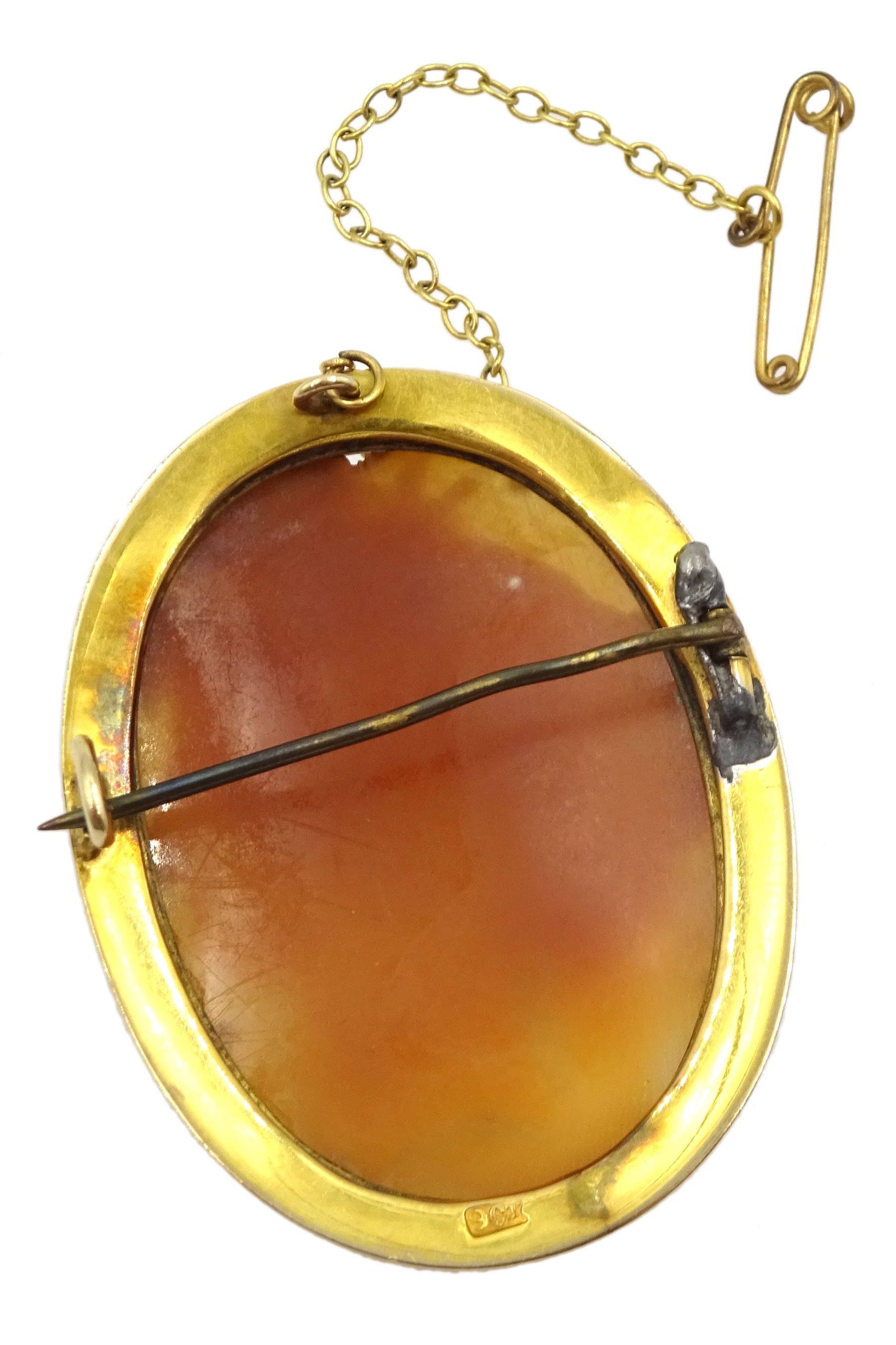 Gold cameo brooch of a classical ladies head, stampe 9ct