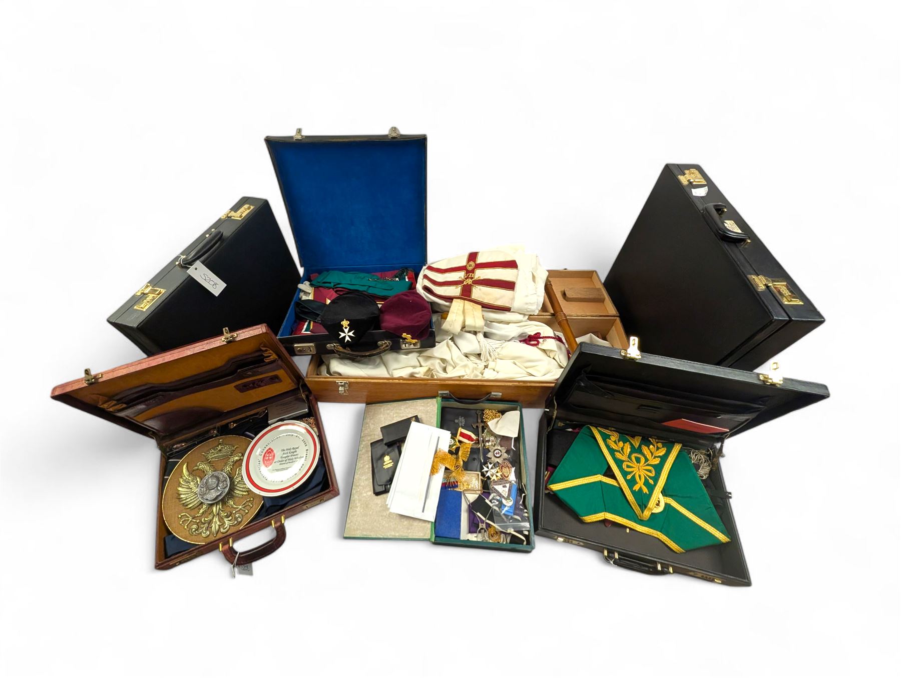 Collection of Masonic jewels and regalia, including robes, sashes, gloves, medallions, etc, in a number of briefcases and boxes