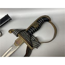 WW2 German Army Officers Dress Sword by Ernst Pack & Sohne MBH Waffenfabrik, the 81.5cm slightly curving fullered blade with makers name to the ricasso, gilt brass hilt with eagle to the cross-piece and relief of oakleaves to the ferrule, knuckle bow and backstrap; grip retains the original wire binding; in original black painted scabbard with single hanging ring, leather hanger crudely etched E. Kurz and silvered knot; numbered 542 to throat of scabbard L96.5cm overall