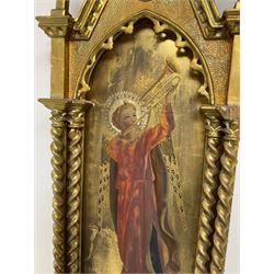 20th century giltwood framed painted panel, with Gothic style arched frame with barley twist columns, a Renaissance style trumpeting angel to the central panel, H69cm