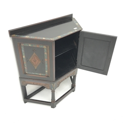 Early 20th century credence cupboard, painted black finish, carved panels, turned supports joined by stretchers, W80cm, H89cm, D33cm