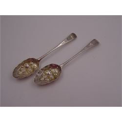 George IV silver fruit serving spoon, the bowl embossed with fruits, with engraved vine leaf decoration to handle, hallmarked London 1789, together with a very similar earlier example, hallmarks worn and indistinct