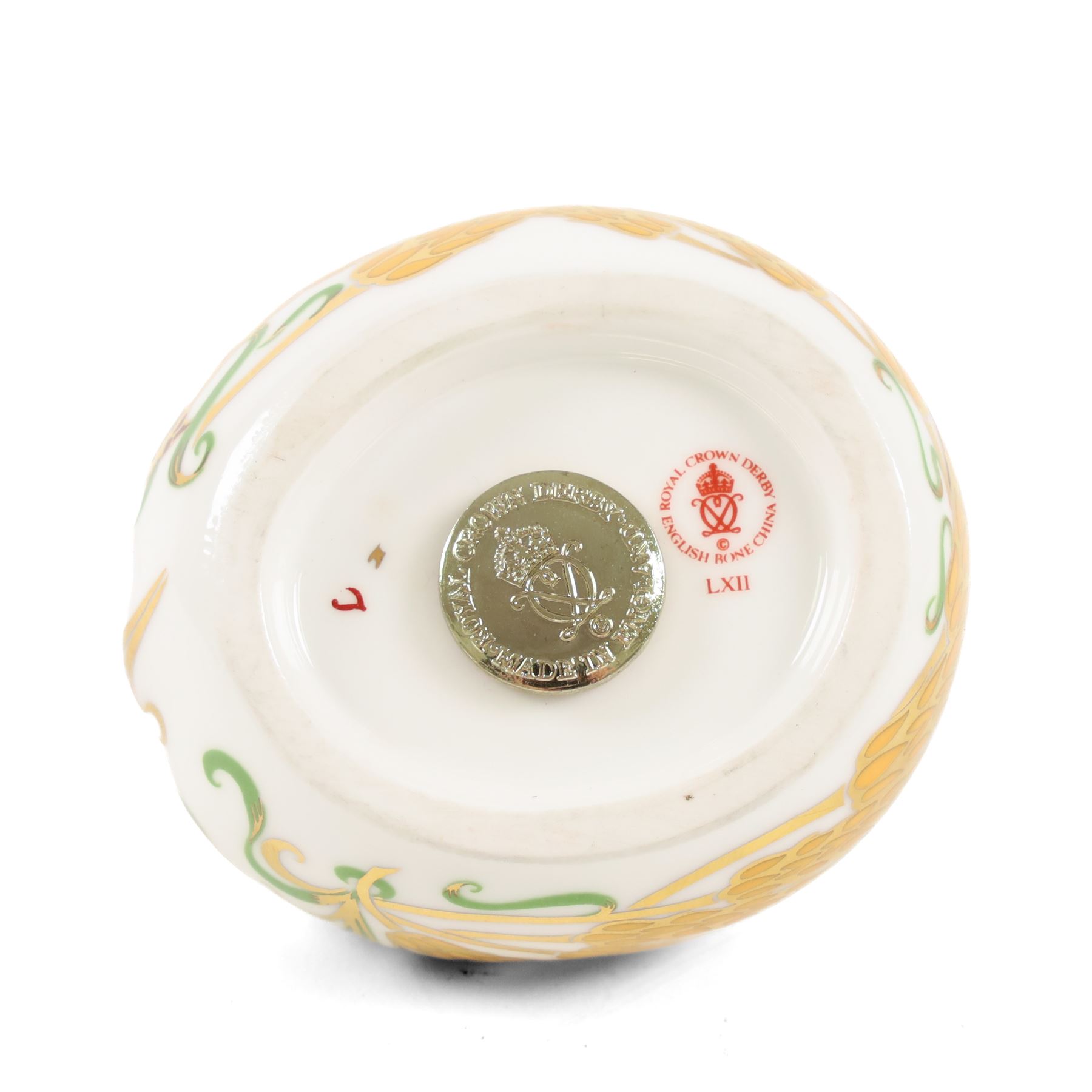Two Royal Crown Derby paperweights comprising Imari Polar Bear with gold stopper and Sleeping Dormouse, with gold stopper  