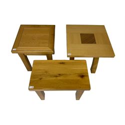 Square light oak side table with two-tone top on curved x-frame supports (55cm x 55cm x 55cm), rectangular oak side table on square tapering supports (60cm x 35cm x 54cm), and square light oak side table on square chamfered supports (50cm x 50cm x 55cm)