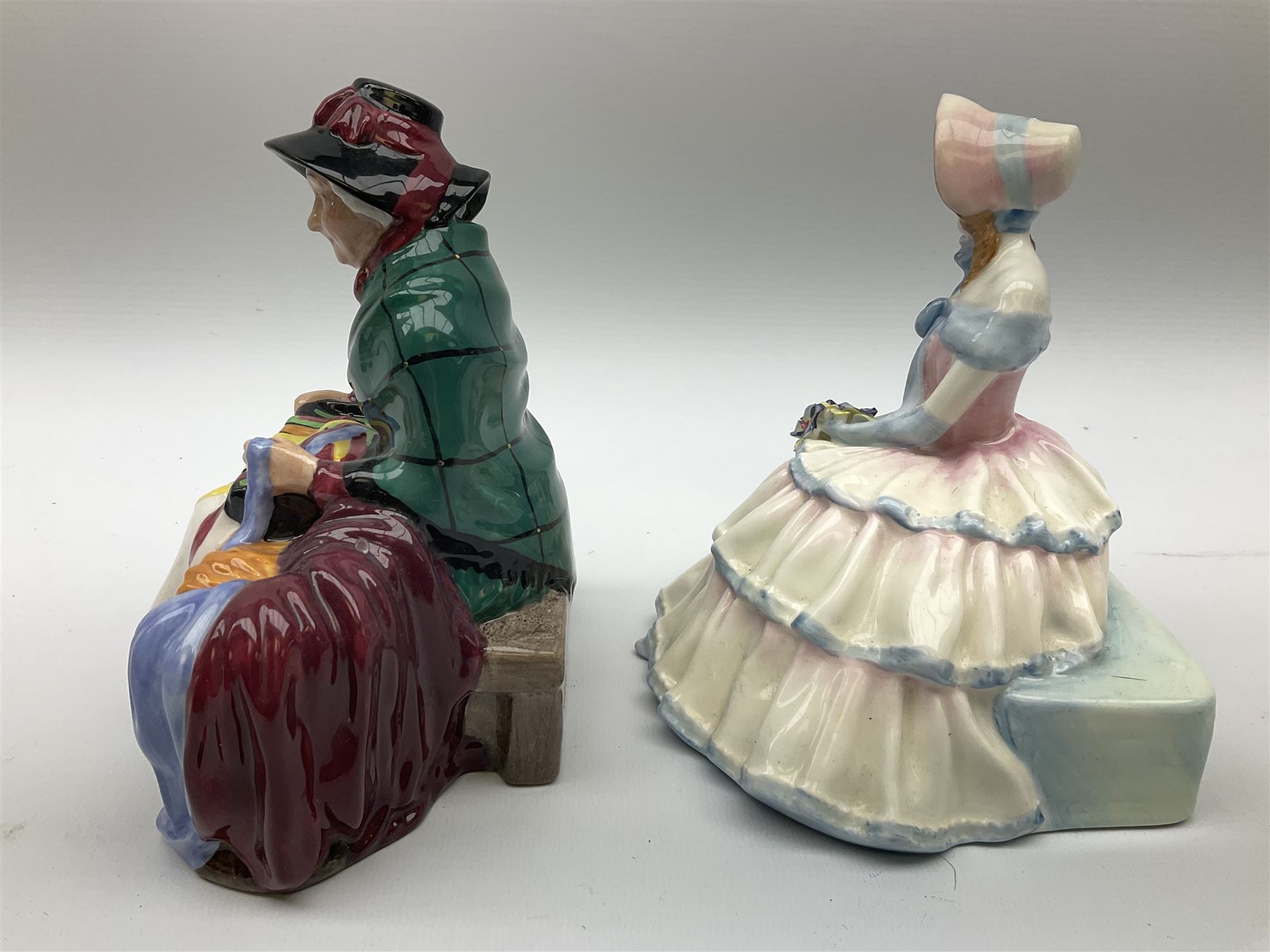 Group of figures, comprising six Royal Doulton examples, Daydreams HN1731, Silks and Ribbons HN2017, Tom Sawyer HN2926, Marie HN1370, Bo-Peep HN1811, and Tinkle Bell HN1677, together with a Dresden type 'lace' example, and a Coalport 'Swiss Cottage', (8)
