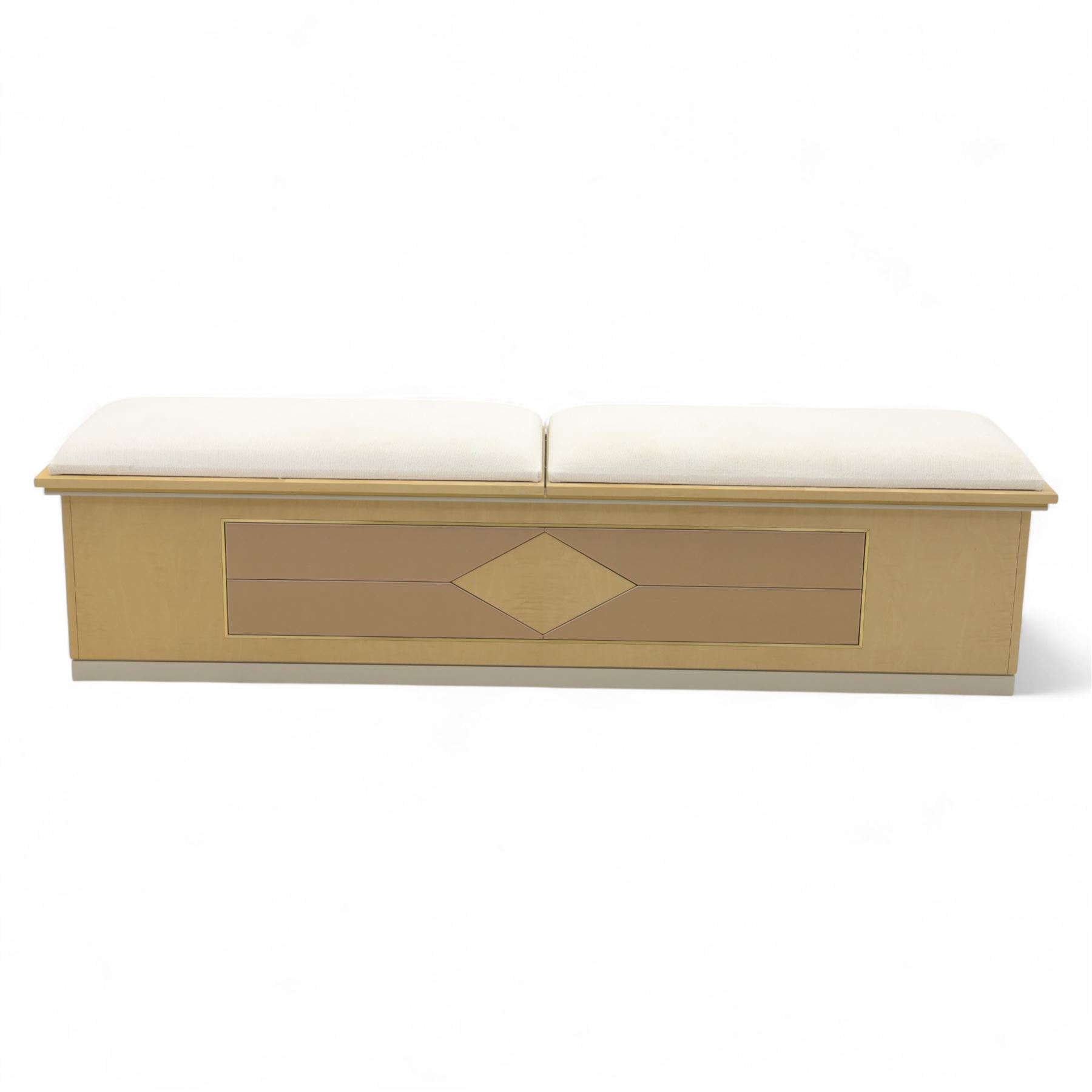 Contemporary maple veneered blanket box, twin upholstered lift-up lids revealing lined storage compartment, geometric panelled front on plinth base