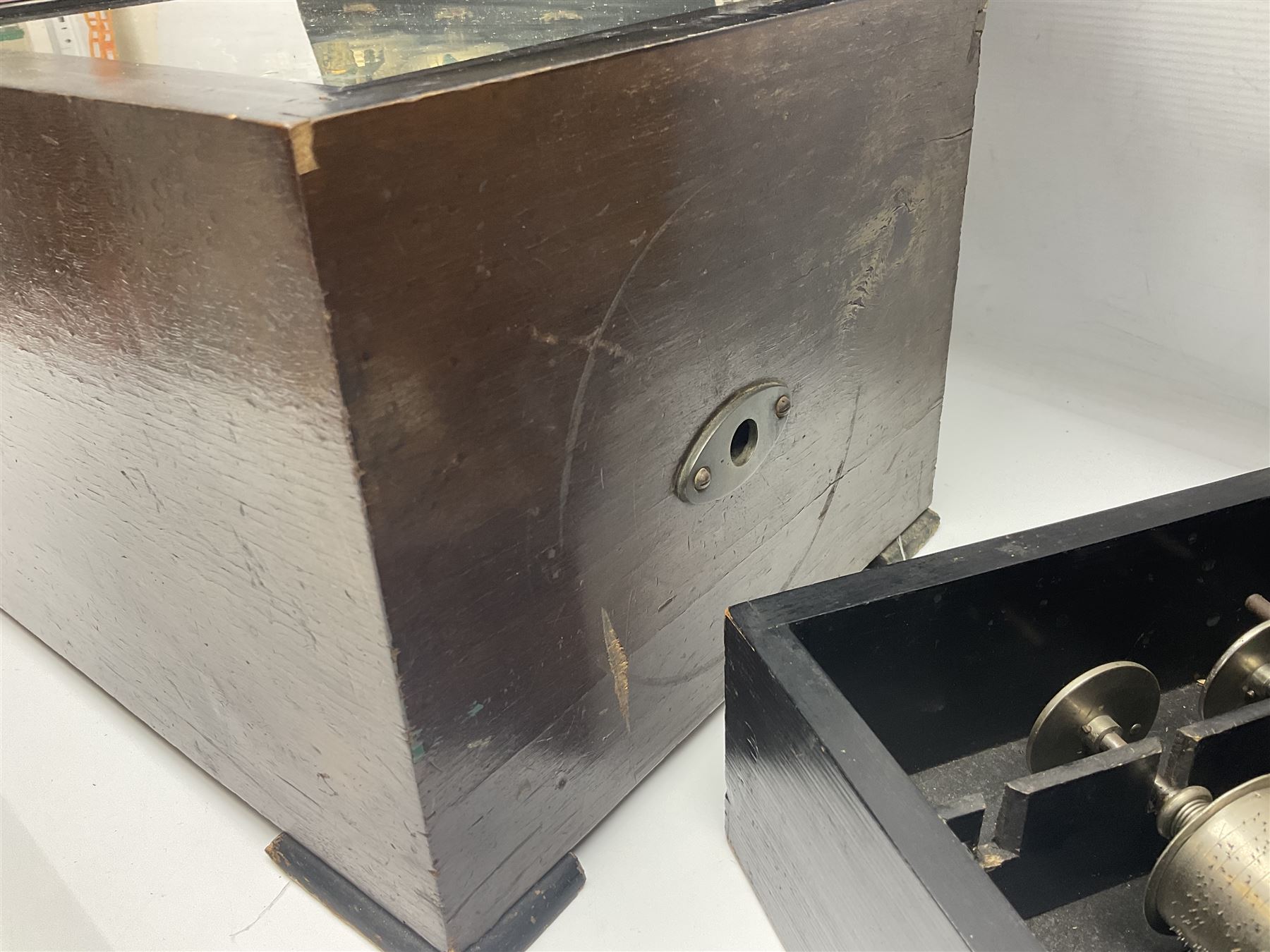 Swiss - 19th-century cylinder music box with three butterfly bells in sight, in a mahogany case with two separately boxed  6” cylinders, glazed viewing lid, 41 tooth comb (one tooth broken) crank key missing, movement untested.