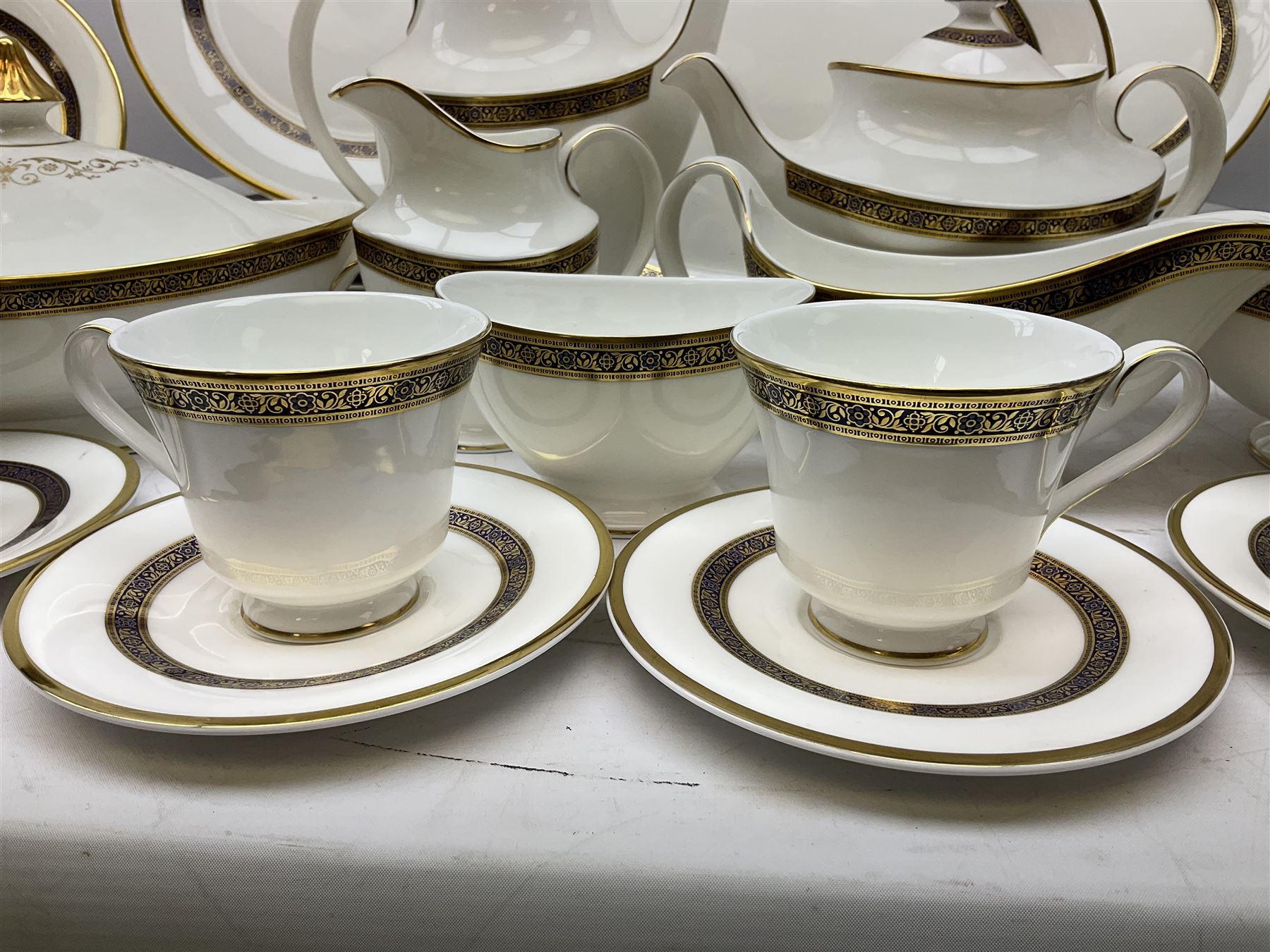 Royal Doulton Harlow pattern tea and dinner service for ten, consisting tea pot, coffee pot, milk jug, open sucrier, cups and saucers, dessert plates, dinner plates, soup bowls, side plates, sauce boat, covered serving dishes, meat plate (67)