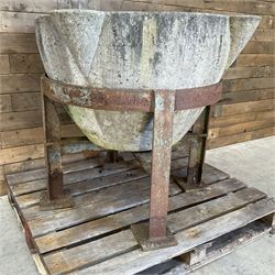 Large 19th century circular stone mortar planter on wrought iron stand