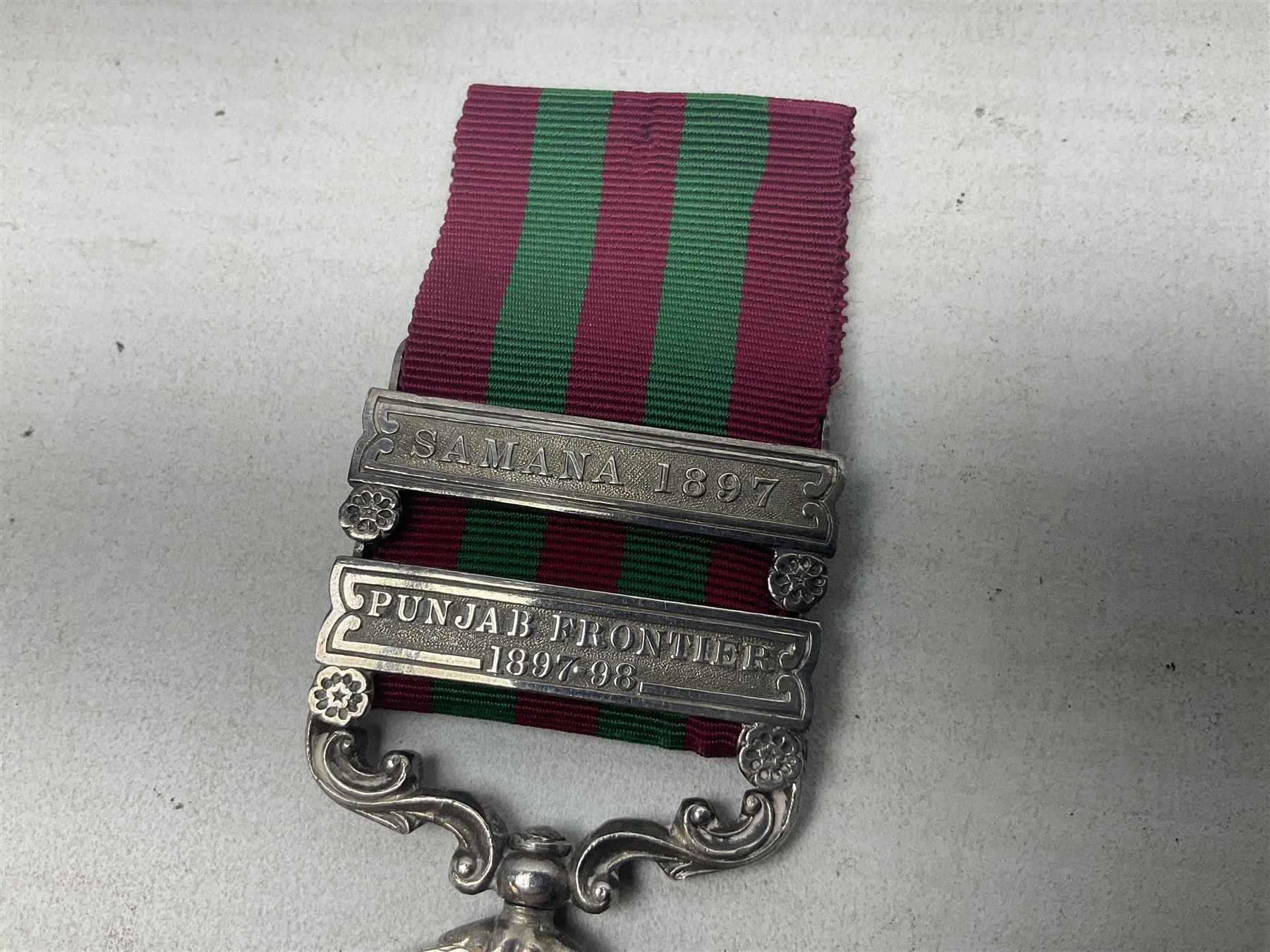 Victoria India General Service Medal with two clasps for Samana 1897 and Punjab Frontier 1897-98 awarded to 4779 Pte. A. Raeburne 2d. Bn. Ryl. Inf. Regt.; with ribbon