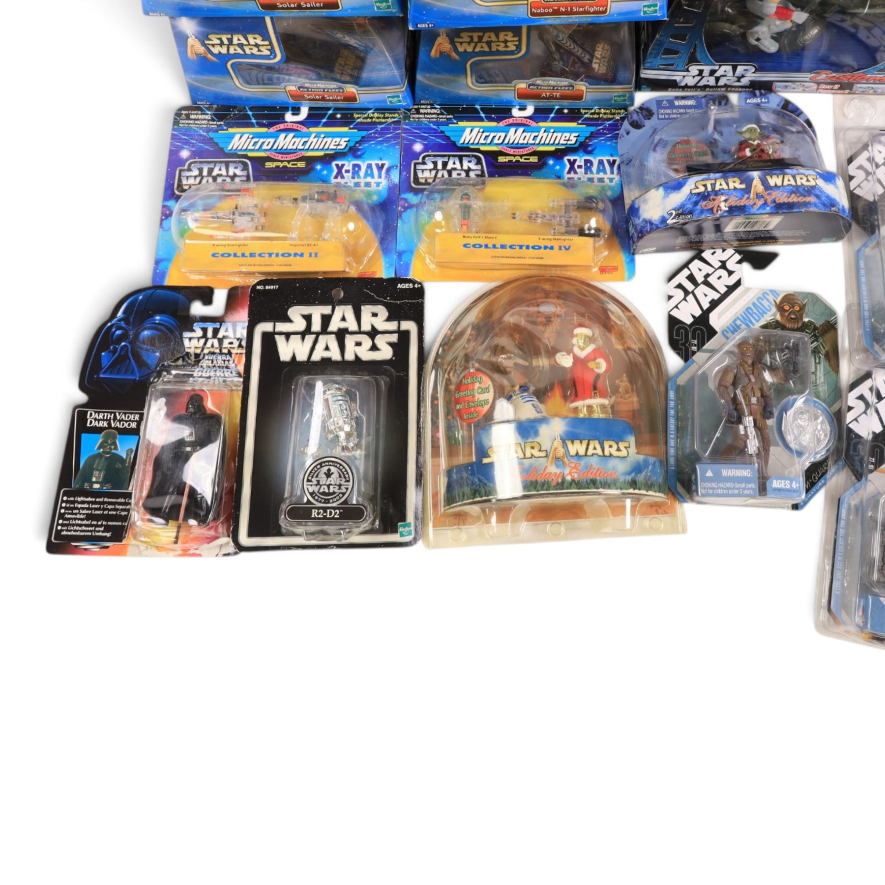 Star Wars action figures, including three Hasbro Concept figures Chewbacca, Luke Skywalker and R2-D2 & C-3PO, four Hasbro figures Anakin Skywalker, Jango Fett, Royal Guard and Silver Anniversary R2-D2, two Hasbro Holiday Edition sets, Gentle Giant Bust Ups Bounty Hunters, Hasbro Customs Boba Fett's Outlaw Chopper, The Kenner Collection Darth Vader, two Galoob Micro Machines X-Ray Fleet packs and four Micro Machines Action Fleet vehicles, all boxed or carded