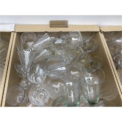Hand-blown green glass decanter, with ceramic gin decanter label, five other glass decanters including hand-blown and cut glass examples, six led crystal tumblers and other glassware including brandy glasses and jugs, in three boxes 