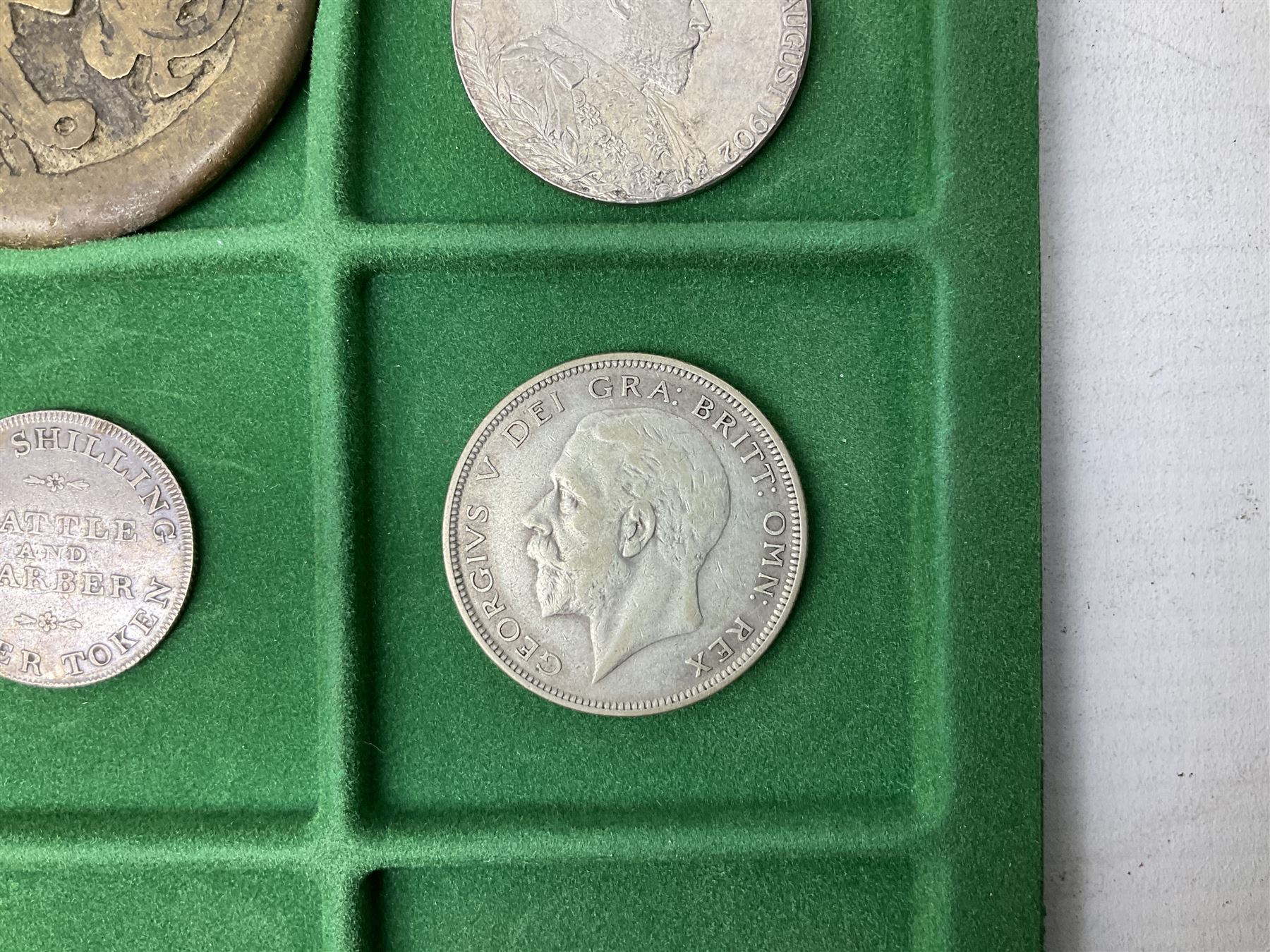 Coins and medallions including, York 1811 one shilling cattle and barber silver token, United States of America 1883O silver Morgan dollar, birds of destiny medal by Malcolm Appleby, Great British King George V 1930 halfcrown, King Edward VII 1902 silver medal, King George V 1916 halfcrown etc, housed in a case with lift out green coin trays