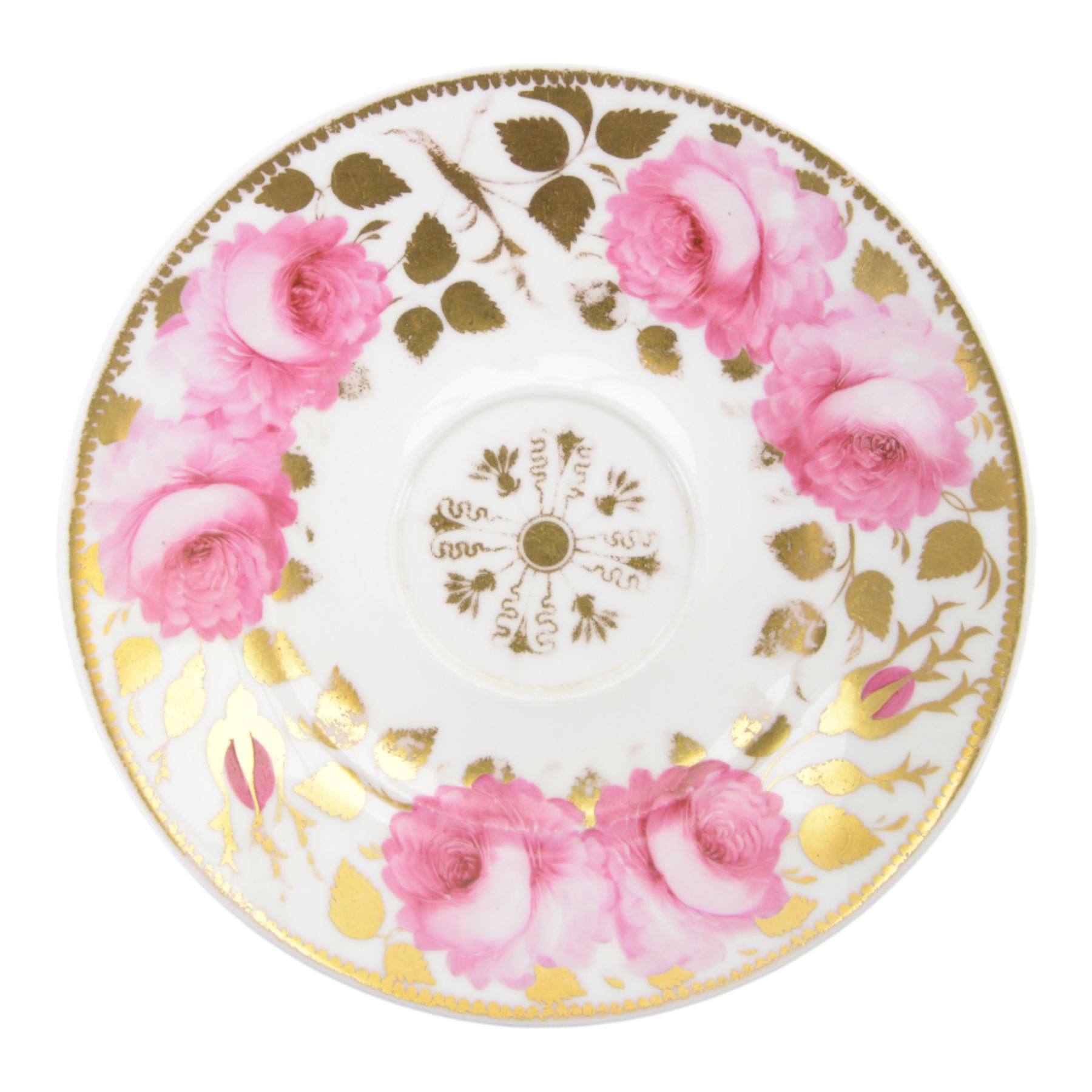 Minton trio, coffee cup, teacup and saucer, circa 1824, moulded ribbed detail, distinctive 'N' handle, painted in pattern no 139, with floral sprays and lilac blue band, coffee cup including handle H8cm, saucer D14cm, together with a Spode trio, coffee cup, teacup and saucer, circa 1830, decorated in the 3886 pattern, painted with pink cabbage roses and heightened with gilt, coffee cup including handle H8cm, saucer D15cm