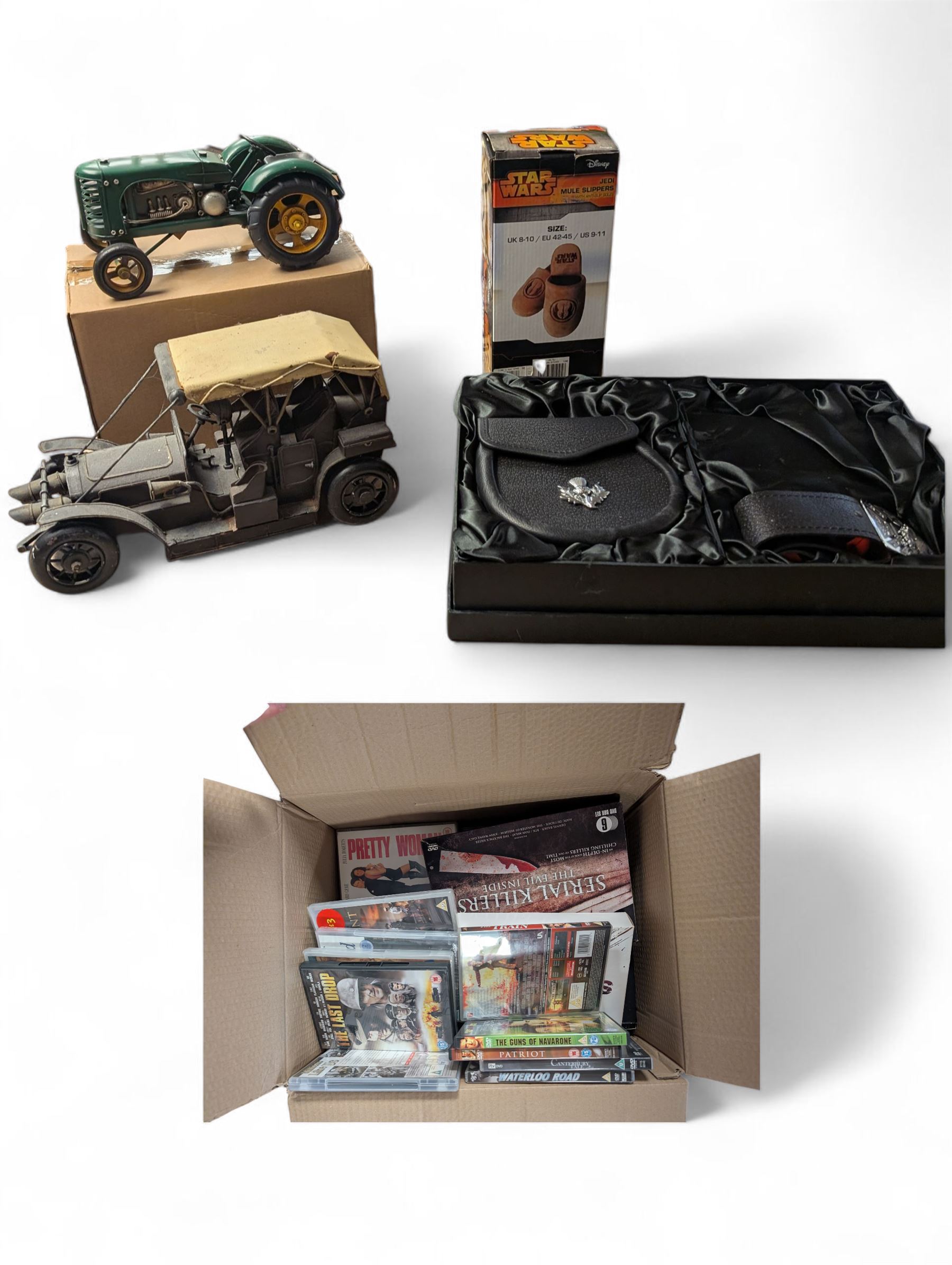 Two metal vehicle models, comprising tractor and car, sporran and kilt belt, Disney Star Wars slippers and a collection of dvds 