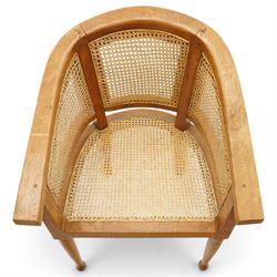 Late 20th century Anglo-Indian teak framed bergère armchair with canework back and seat, raised on tapering supports
Provenance: purchased Liberty & Co in the 1990s from the oriental line