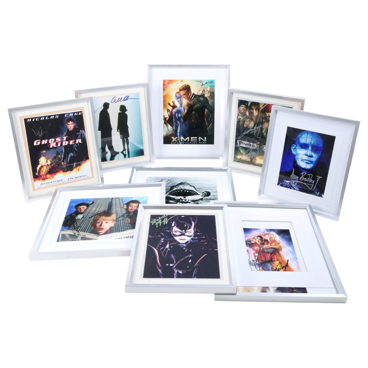 Collection of film related prints, all with spurious cast signatures, including Home Alone, Ghost Rider, Pirates of the Caribbean etc