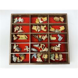 Collection of whimsy figures in a wooden display case, together with other assorted collectables, including stamps, pin badges etc