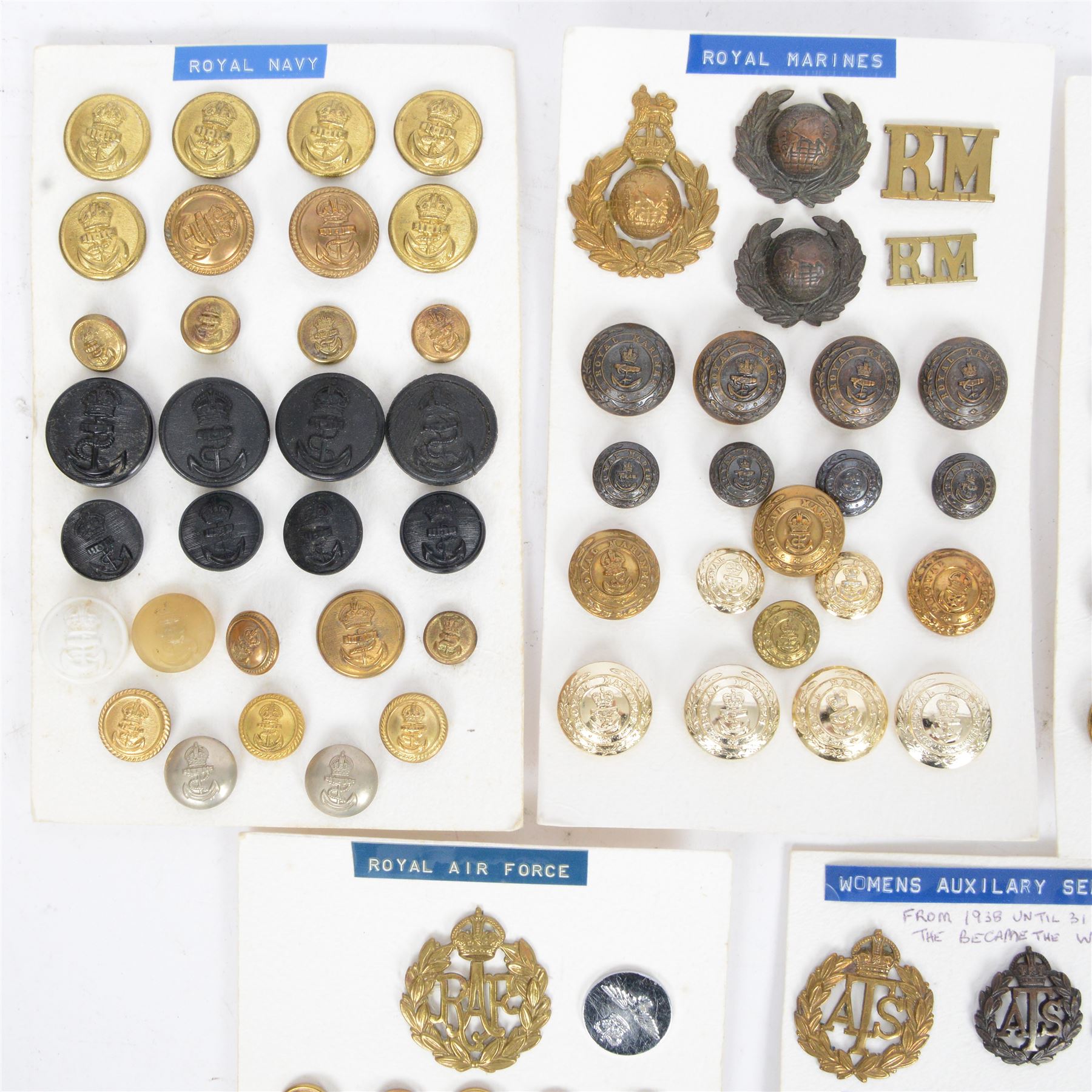 Collection of military cap badges and buttons examples from Royal Air Force, Royal Marines, Royal Navy, Air Training Corps, Women's Auxilary Service and Womans Royal Army Corps  