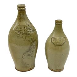  19th century salt glazed stoneware gin bottle impressed John Shaw, Red Lion Vaults, Whitefriargate, Hull of bulbous oval form H27cm and another with impressed label for J. Christie Mytongate Hull (2)  