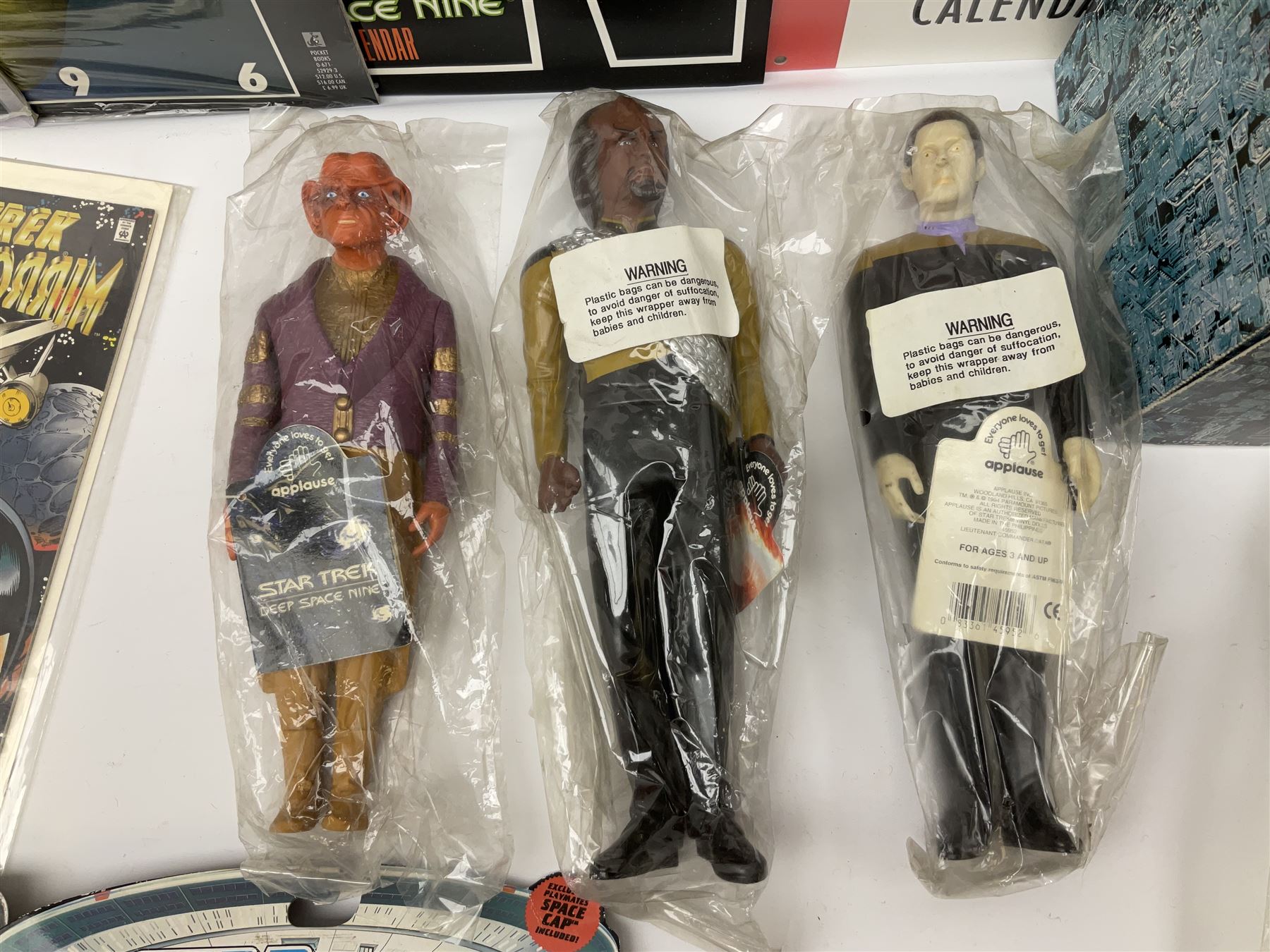 Quantity of Star Trek memorabilia and promotional merchandise including action figures, calendars, mobile kit, collector's fact cards, models etc; many in original packaging