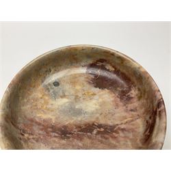 Pink veined marble bowl, of circular form, upon a spreading circular foot, D22cm, H12cm