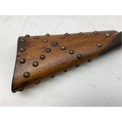 Composed decorative percussion action sporting gun, the 79cm barrel with ramrod under and Indian style studded stock L124cm overall