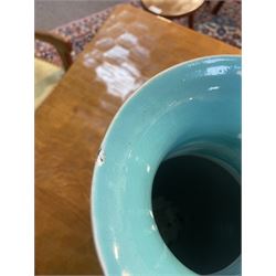 19th century Chinese famille rose yellow ground porcelain vase, of baluster form with twin applied mask ring handles, the body decorated with two shaped reserves mounted with dragon heads, depicting warriors at battle and at court, the neck with two smaller conforming figural reserves, upon a yellow ground decorated with exotic birds amidst scrolling blossom, H45.cm