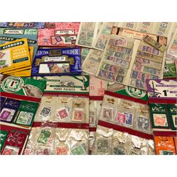 Collection of stamps including packets still mounted to the original shop cards, reading 'A Darracott Product Stamps 1d per pkt' etc, Countries include China, Spain, Argentina, Liberia, Denmark etc, in one box