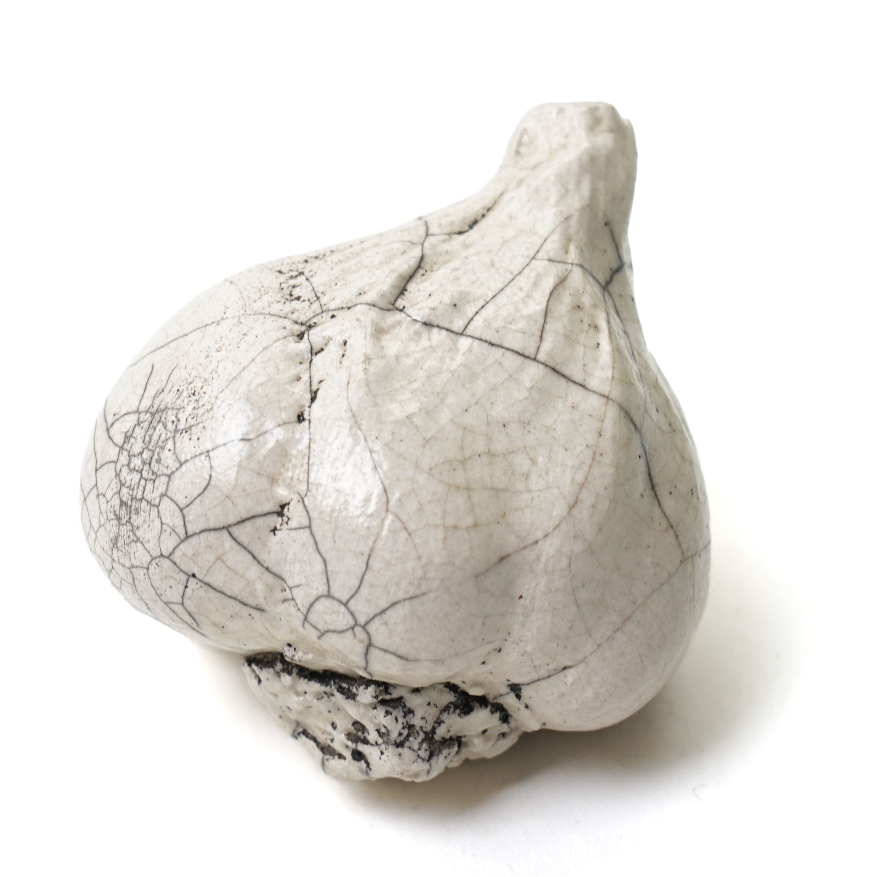 Collection of ceramic fruit and vegetables, including raku examples, comprising two walnuts, three mushrooms, one garlic bulb, a pear and an apple