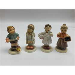 Thirty Hummel figures by Goebel, to include Saluting the Peacekeepers of Operation Joint Endeavor, on wooden plinth, Call to Glory, Celebrate with Song and Soldier Boy