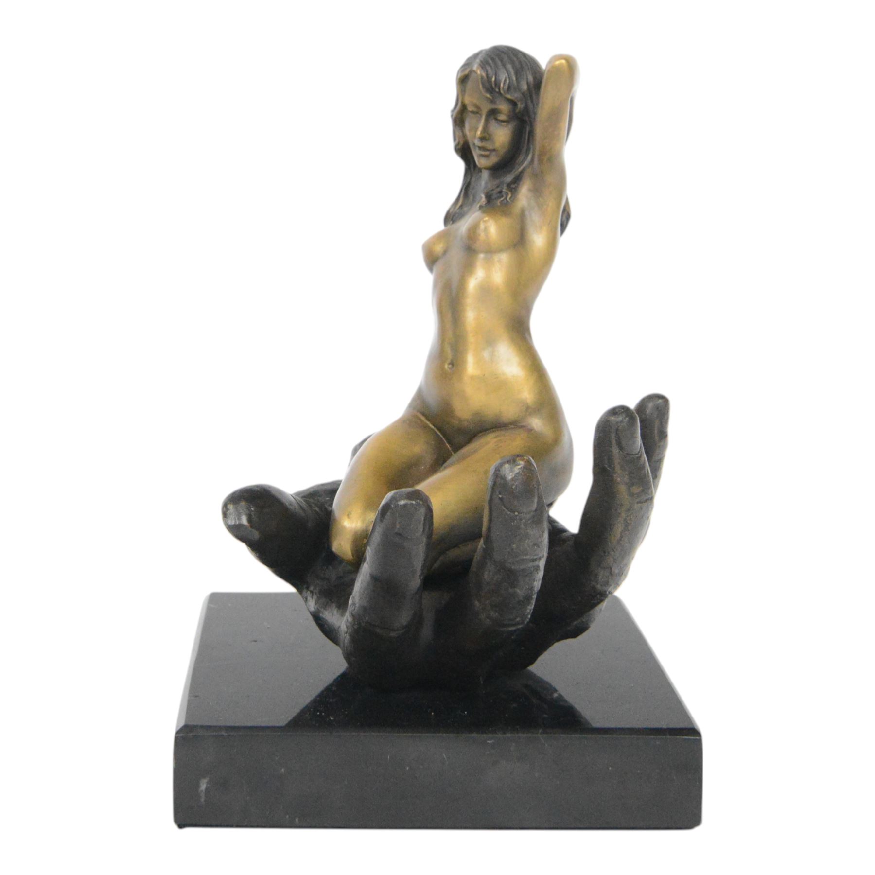 Nude In Hand bronze sculpture modeled as a female nude seated in a hand upon a marble base, signed June H24cm   