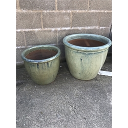 Pair green glazed graduating terracotta planters, D56cm (max)