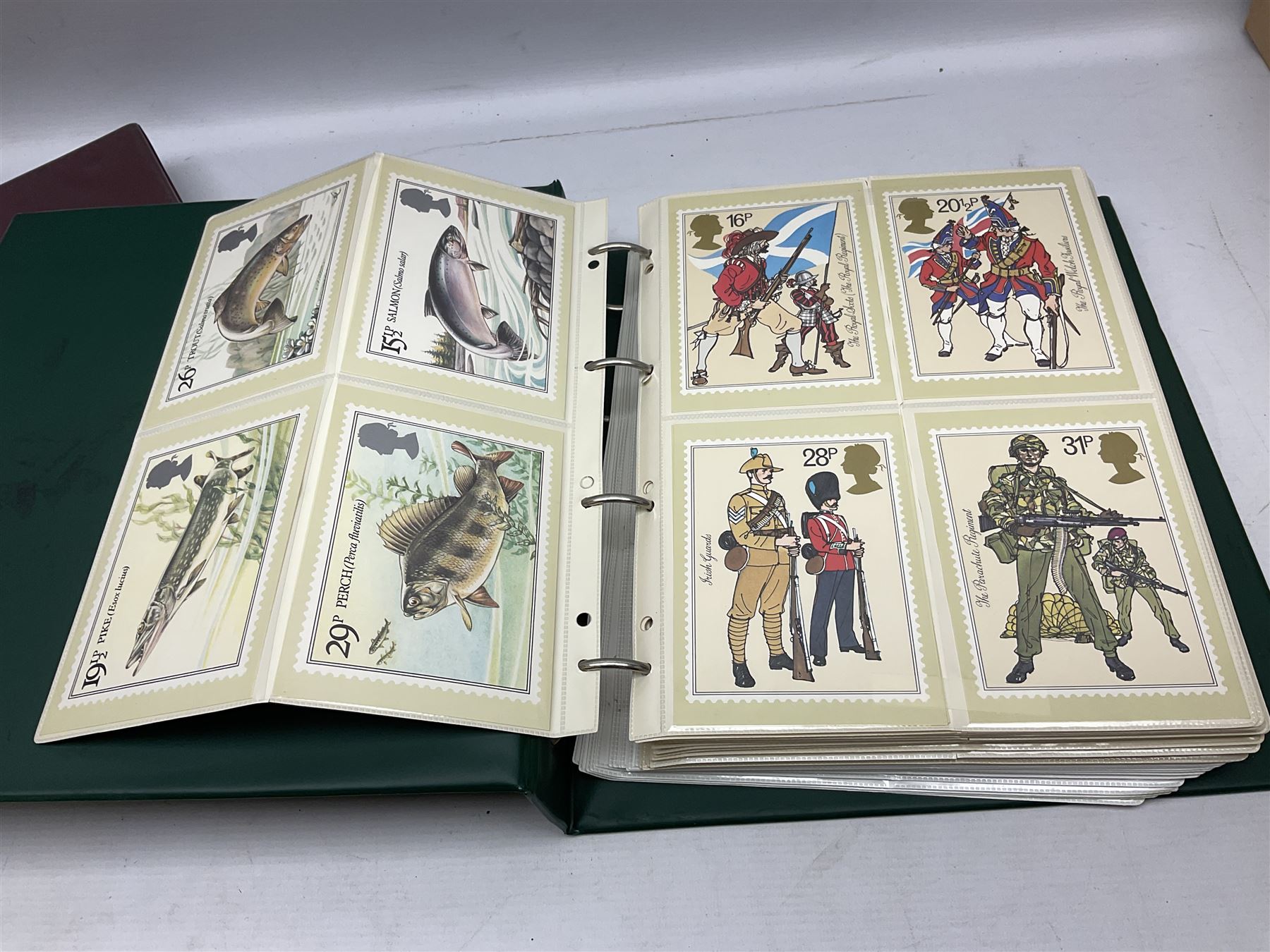 Various Royal Mail PHQ cards, first day covers, World stamps including Poland, Uruguay, Pakistan etc, housed in sixteen albums / folders, in one box