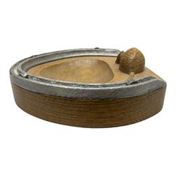 Mouseman - oak horseshoe ashtray, rounded triangular form with mounted horseshoe, carved with mouse signature, by the workshop of Robert Thompson, Kilburn, L13cm