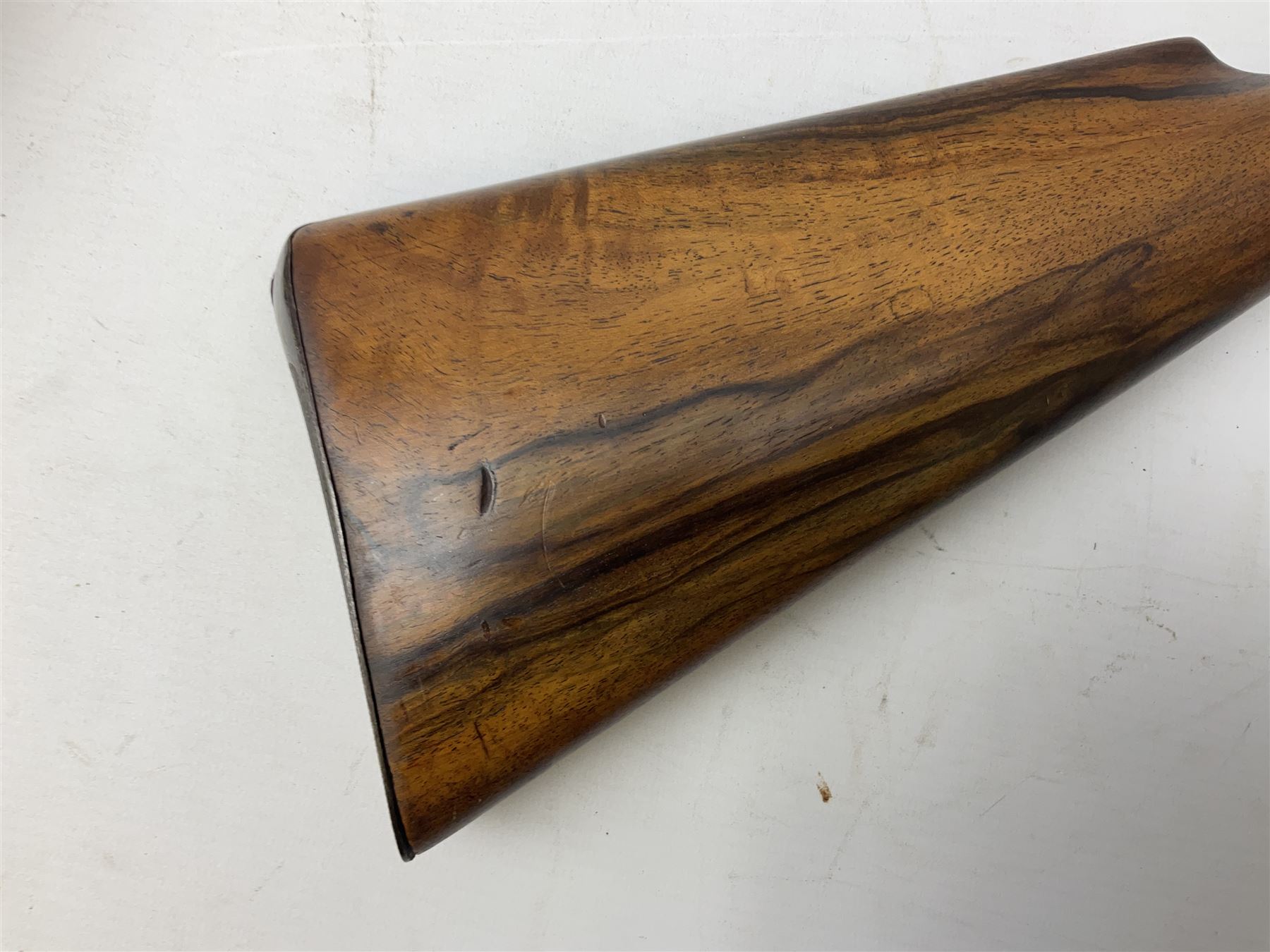 Manton .577/450 Martini Henry rifle, the 82.5cm smooth bored barrel proofed for shot, two barrel bands and bayonet fitting, engraved action with side safety, figured walnut stock with chequered steel butt plate, complete with ramrod, NVN other than 5346 on barrel, L125cm