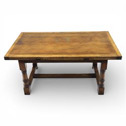 Titchmarsh & Goodwin - stained oak draw leaf dining table, raised on turned supports with H-stretcher, extends to 273cm